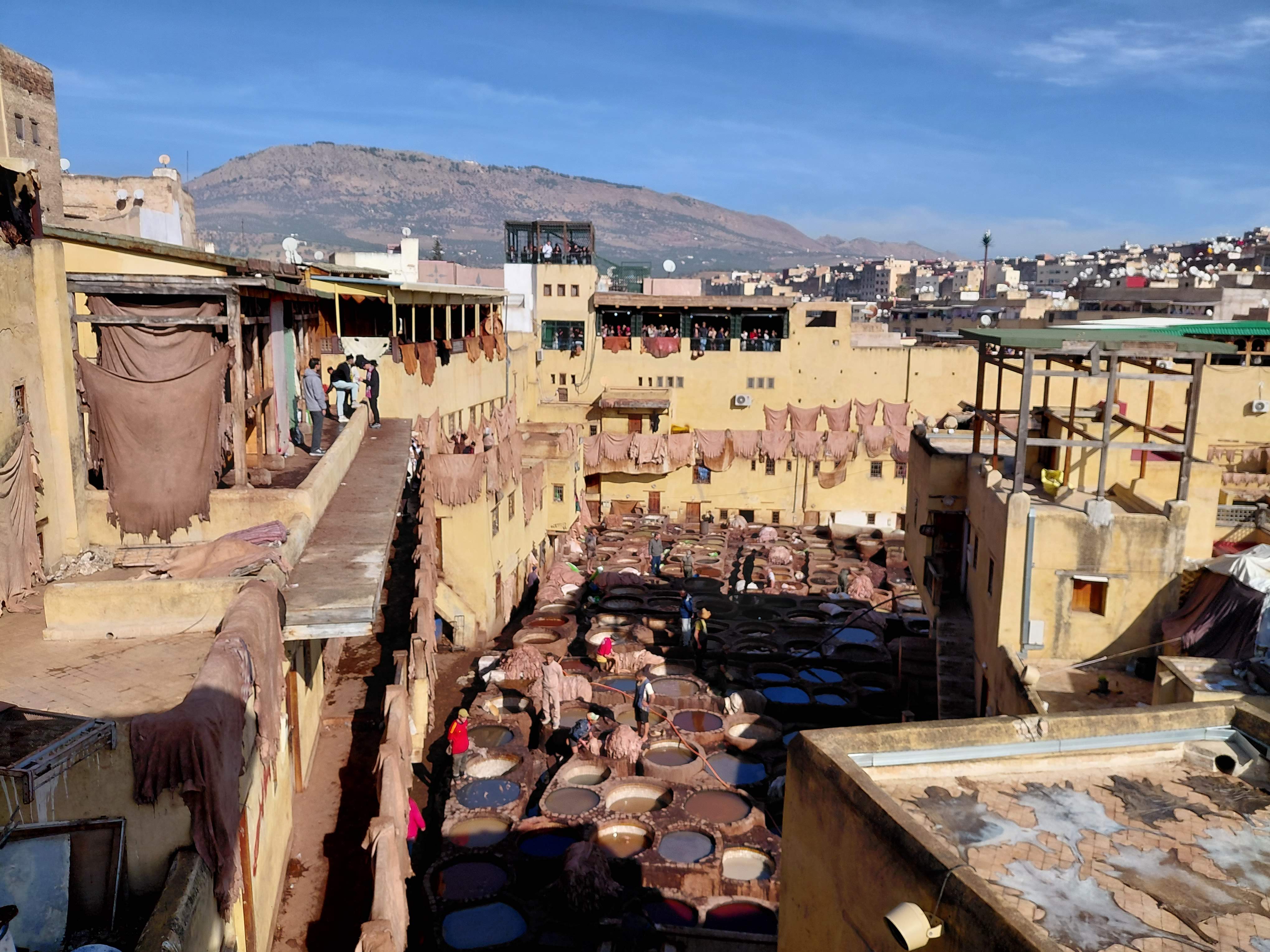 Traditional leather tannery in Fez with colorful dye vats